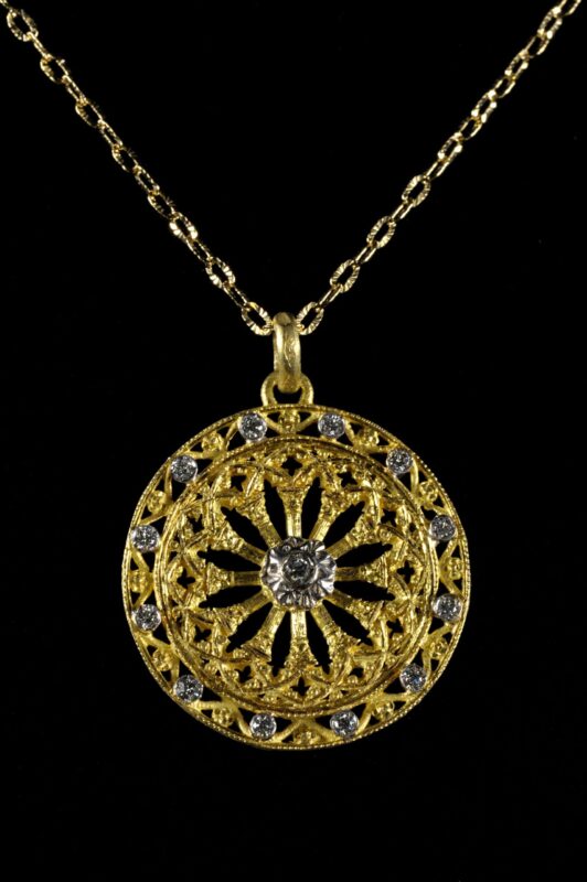 Rosone di sant'Agostino di Palermo oro e pietre naturali | Gioielleria Montaldi